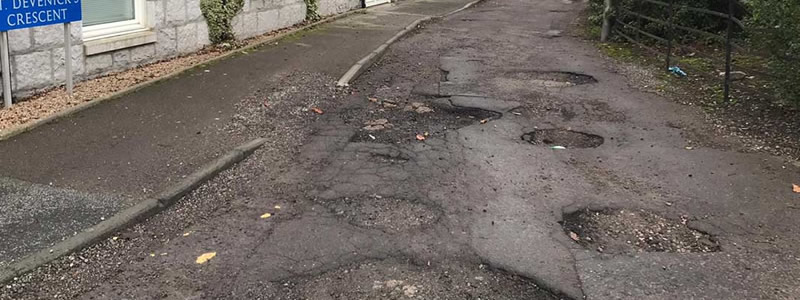 Pothole on a road in the United Kingdom